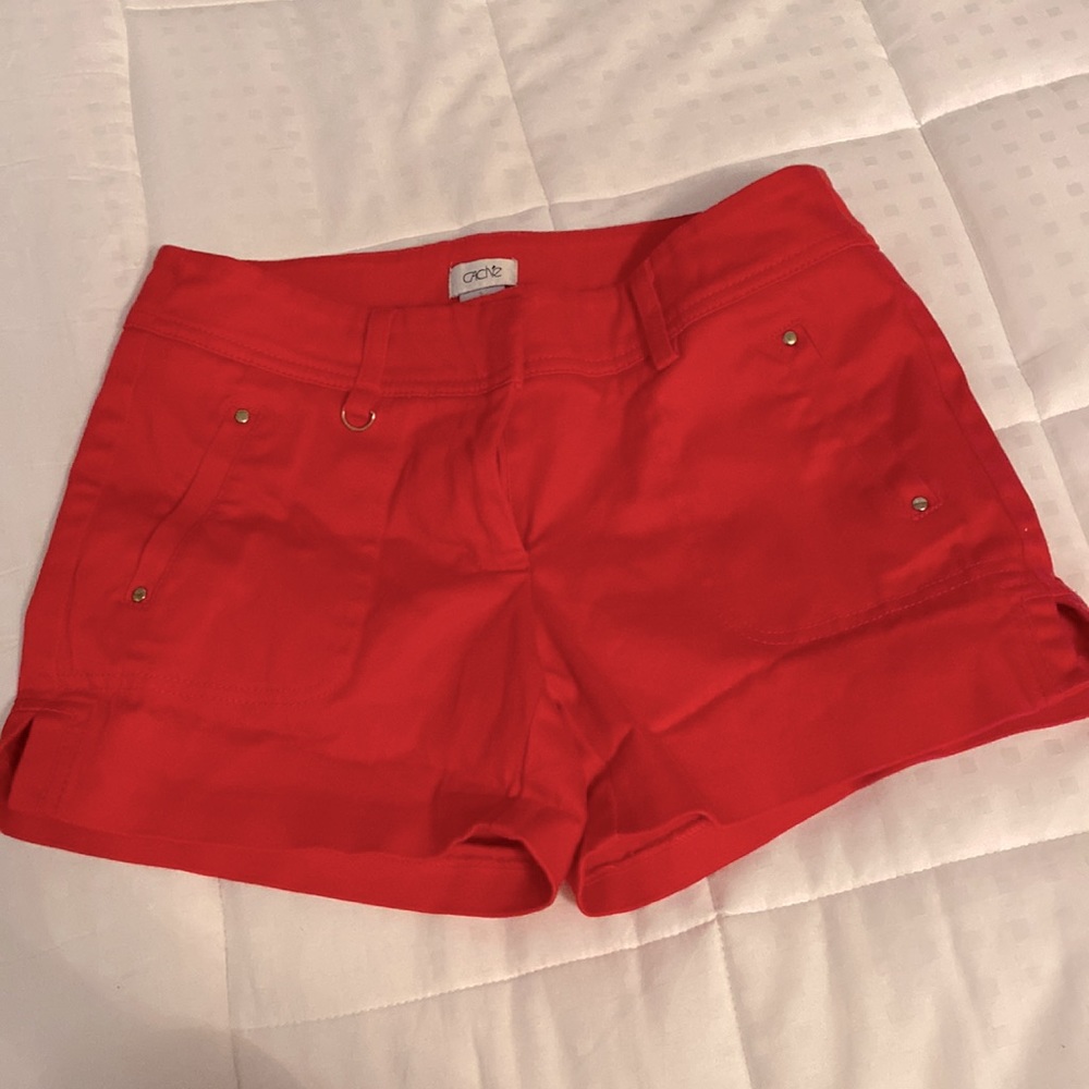 Cause burnt orange size 2. Never worn!